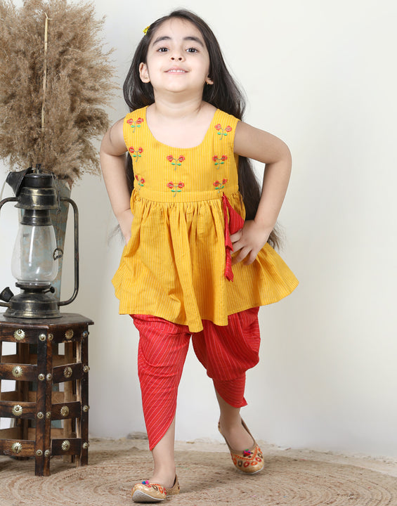 Yellow Embroidered kurti paired with dhoti