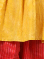 Yellow Embroidered kurti paired with dhoti