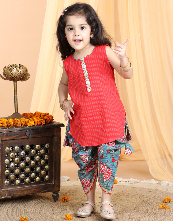Floral printed dhoti paired with katha Kurti with a lace border at the neckline