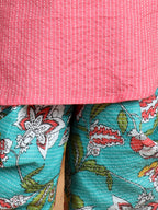 Floral printed dhoti paired with Peach katha Kurti with a lace border at the neckline