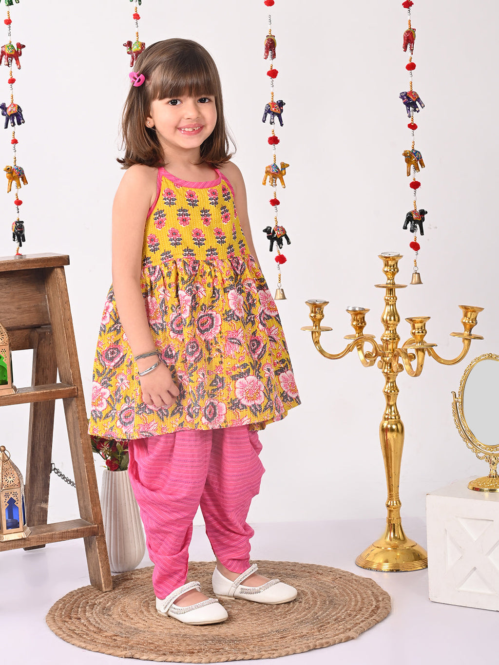 Yellow Floral halter style Kurti with pink  dhoti