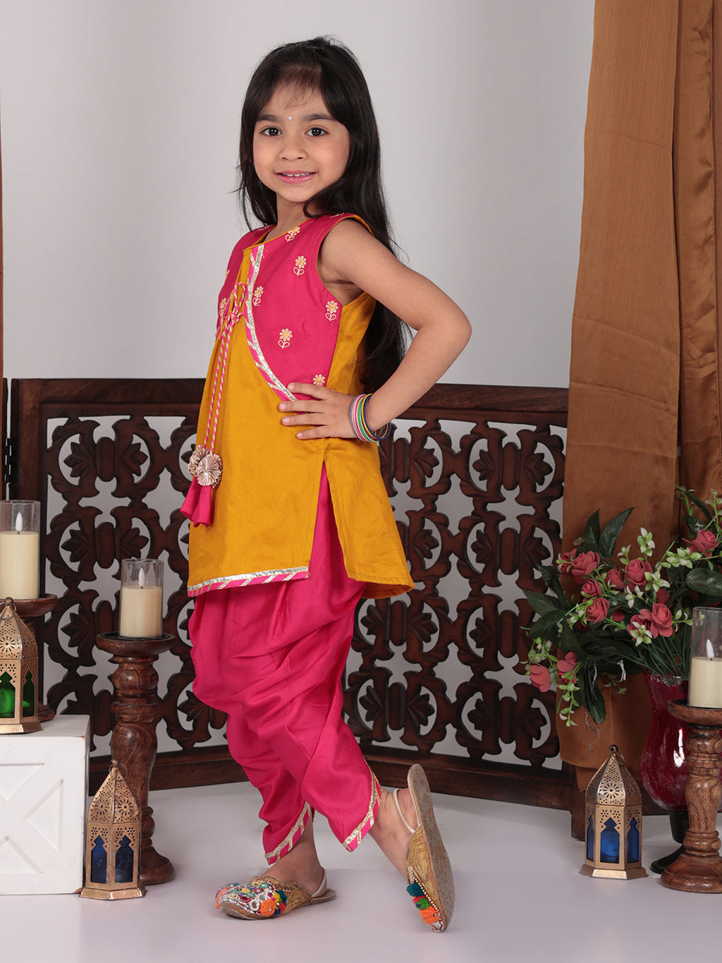 Yellow Kurti with pink embroidered attached jacket  and dhoti