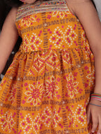 Yellow sleeveless kurti with pink dhoti