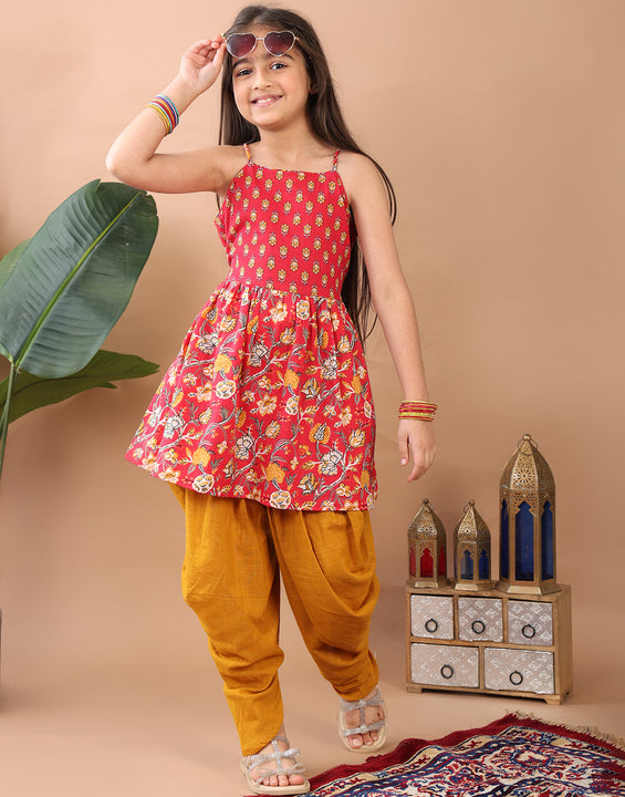 Red Floral  printed sleeveless Kurti  paired with Yellow Dhoti