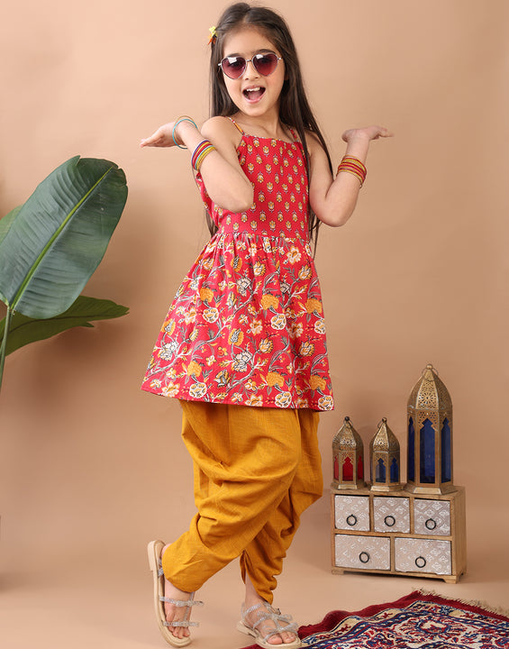 Red Floral  printed sleeveless Kurti  paired with Yellow Dhoti