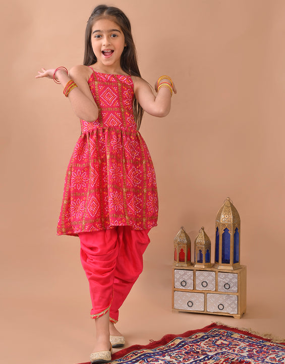 Pink Bandez printed sleeveless Kurti  paired with Pink Dhoti