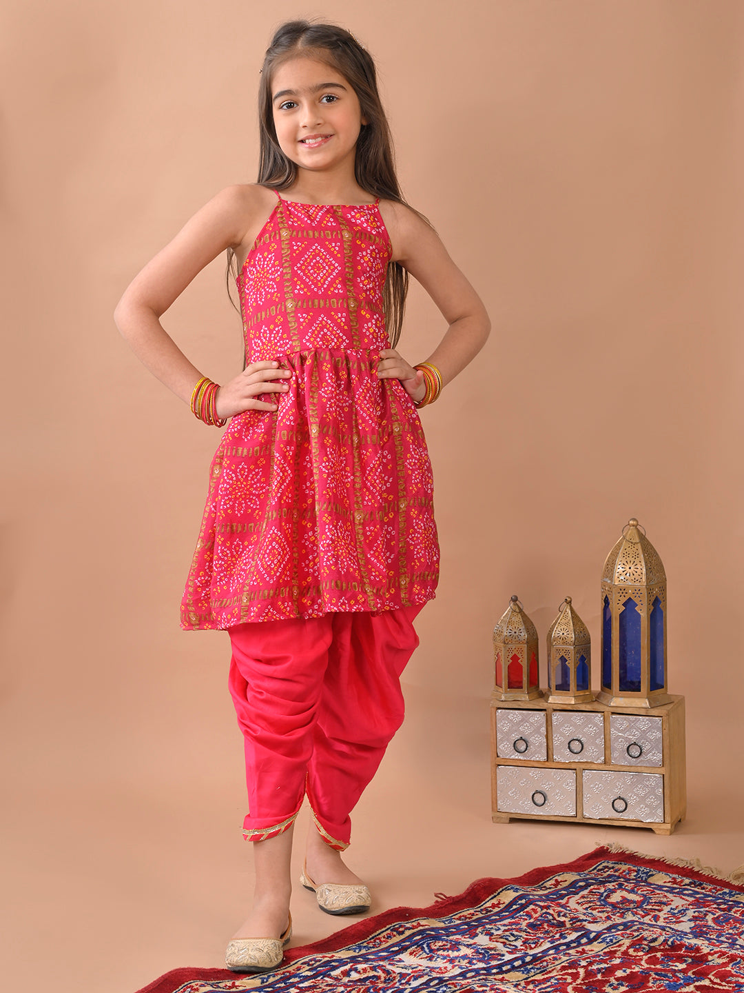 Pink Bandez printed sleeveless Kurti  paired with Pink Dhoti