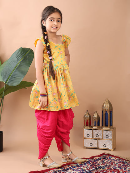 Yellow Lotus  printed sleeveless Kurti  paired with Pink Dhoti