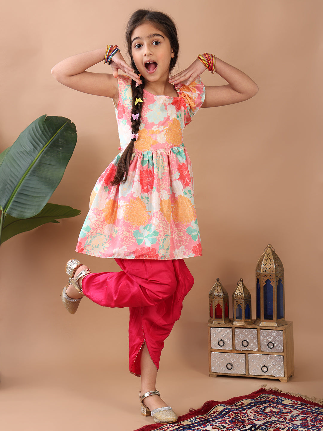 Light Pink Floral  printed sleeveless Kurti  paired with Pink Dhoti