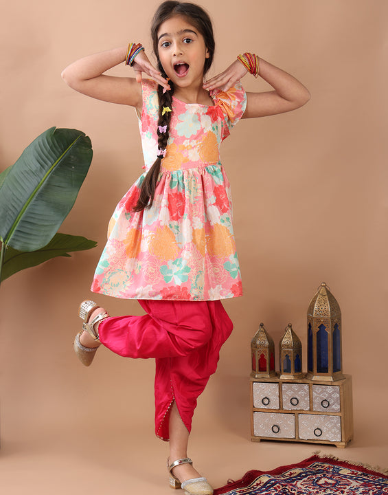 Light Pink Floral  printed sleeveless Kurti  paired with Pink Dhoti