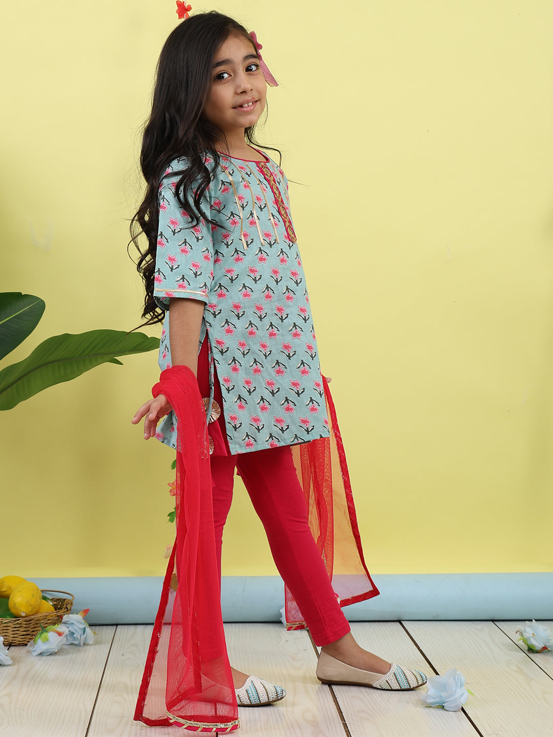 Green 3/4 sleeves printed cotton kurti  paired with Pink leggings with Dupatta
