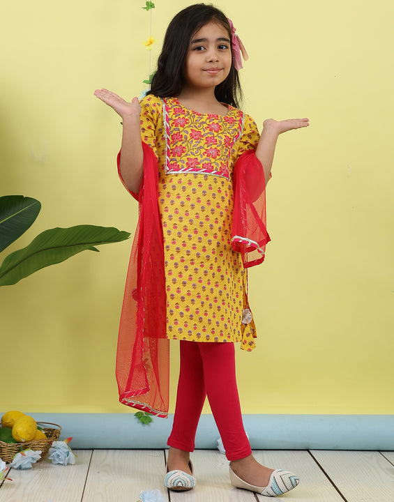 Yellow 3/4 sleeves printed cotton kurti  paired with Pink leggings with Dupatta