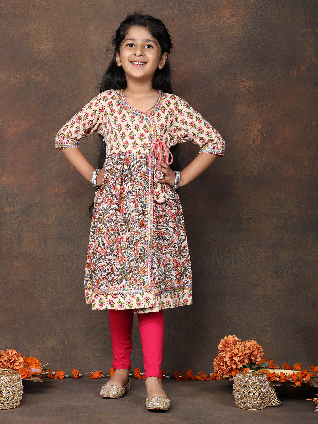 Peach 3/4 sleeves printed cotton Angrakha Kurti  paired with Pink Leggings