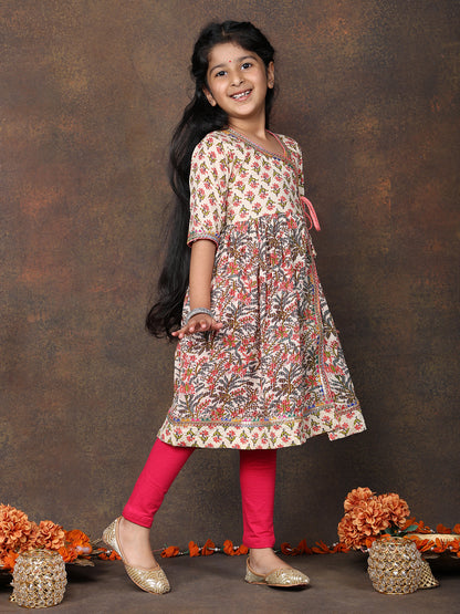 Peach 3/4 sleeves printed cotton Angrakha Kurti  paired with Pink Leggings