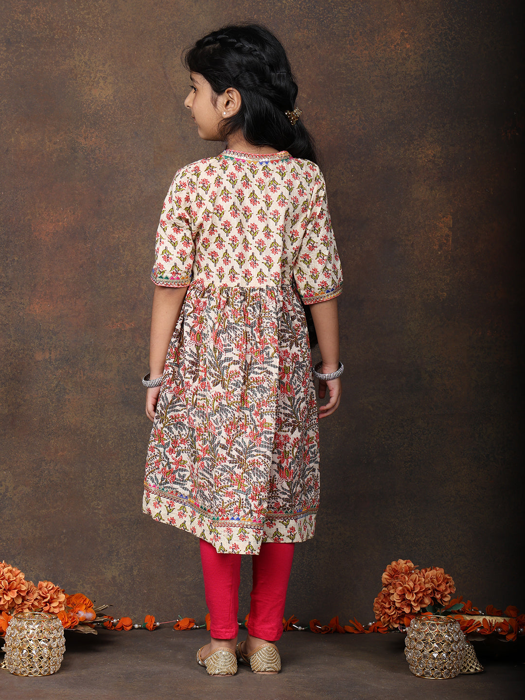 Peach 3/4 sleeves printed cotton Angrakha Kurti  paired with Pink Leggings