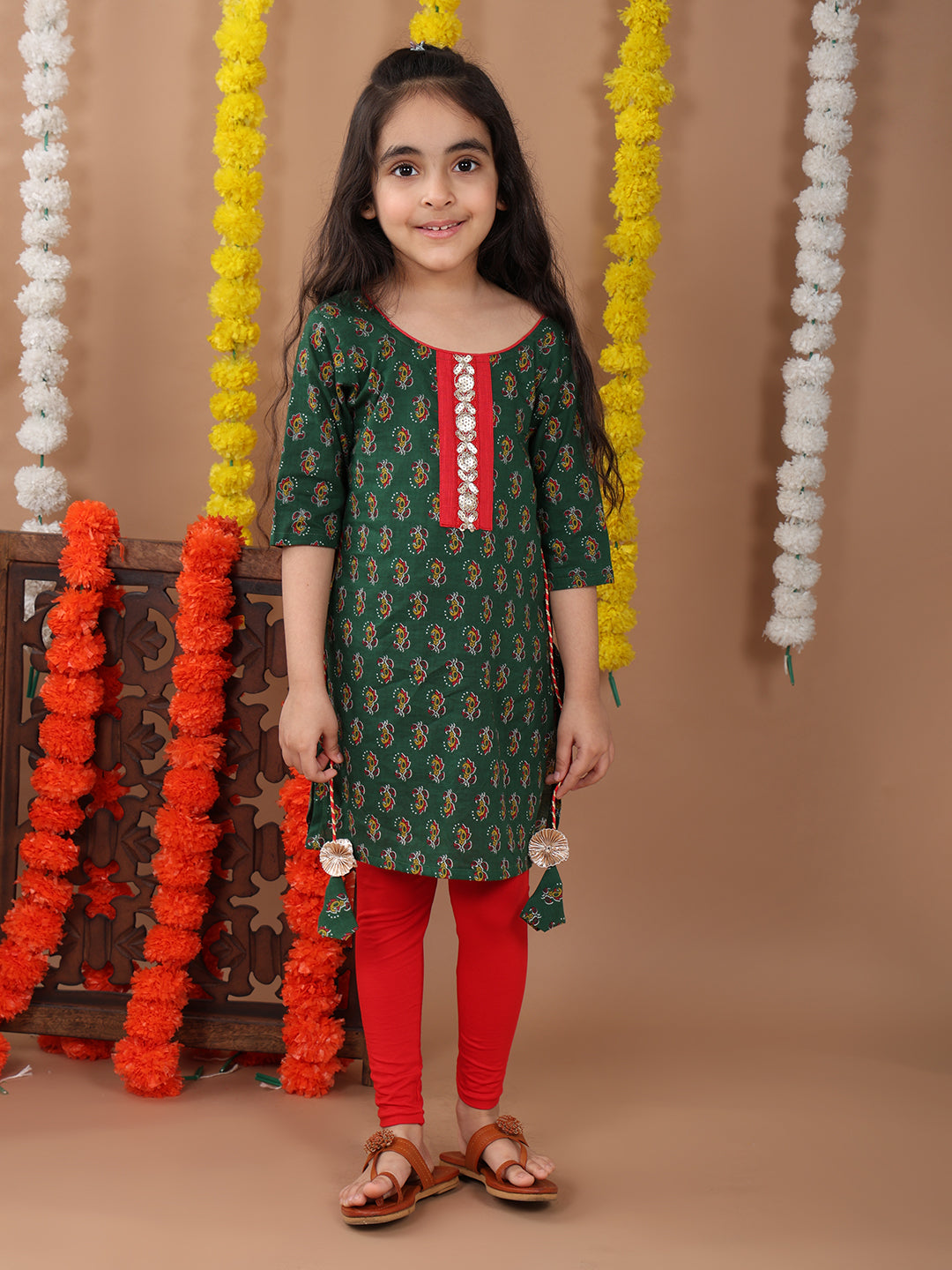 Green 3/4 sleeves printed cotton kurti with Red leggings