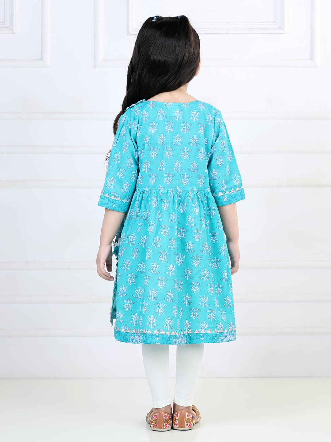 Blue printed angrakha style kurti with white leggings