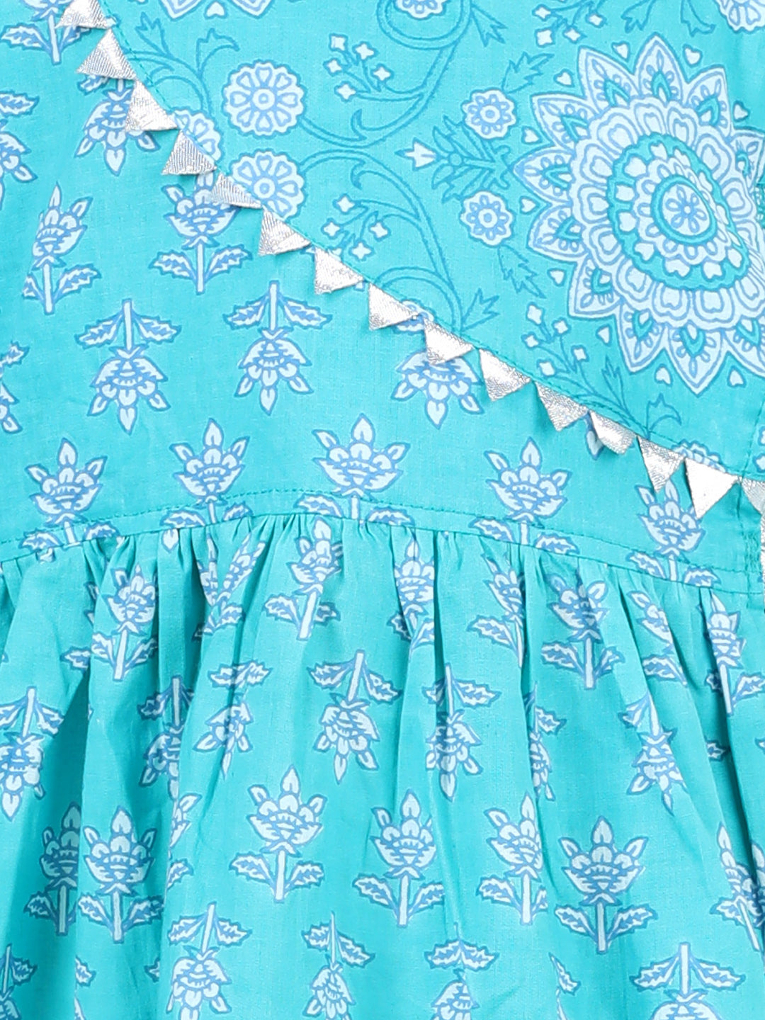 Blue printed angrakha style kurti with white leggings