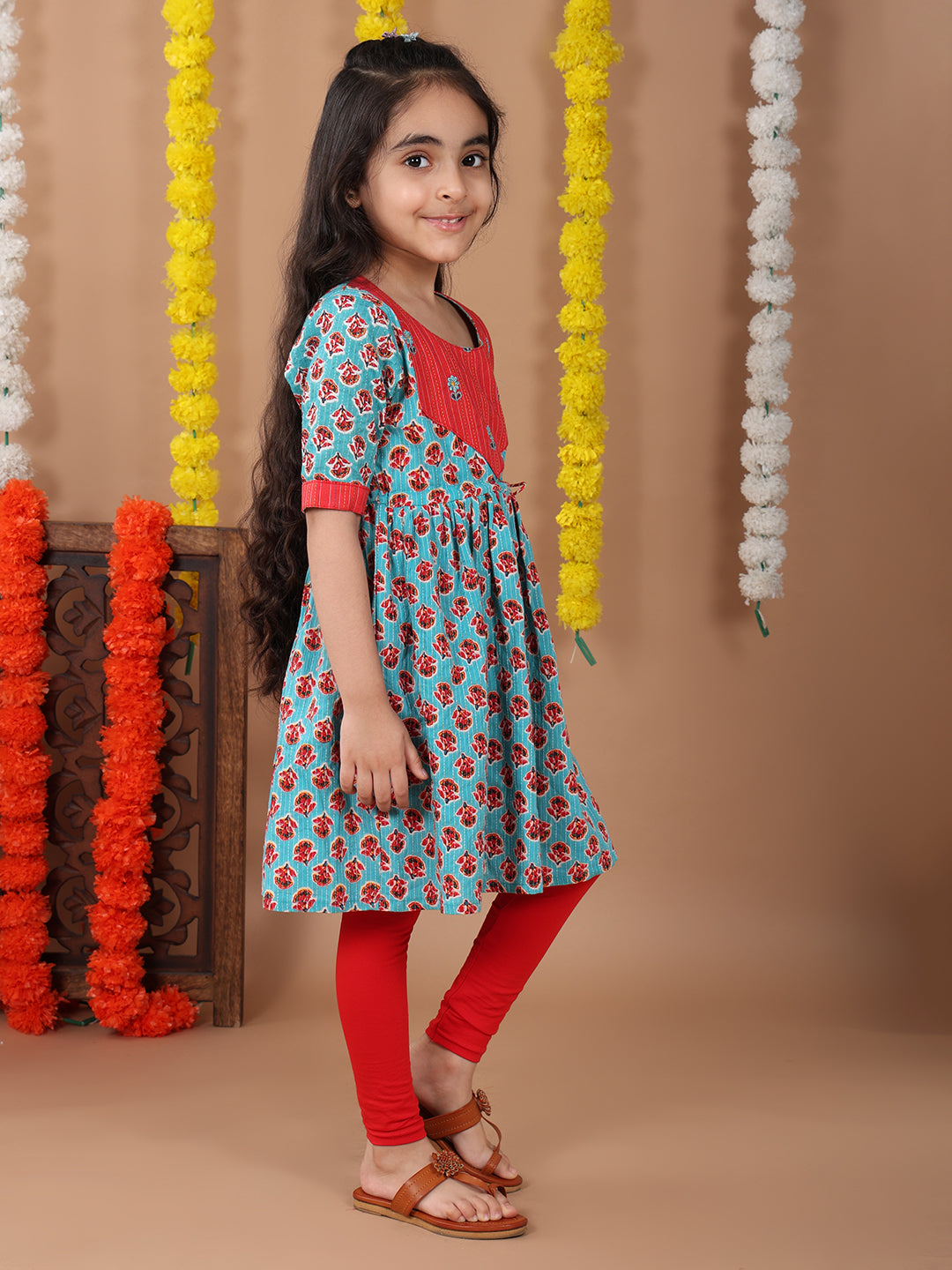 Green 3/4 sleeves embroidered cotton kurti with Red Leggings