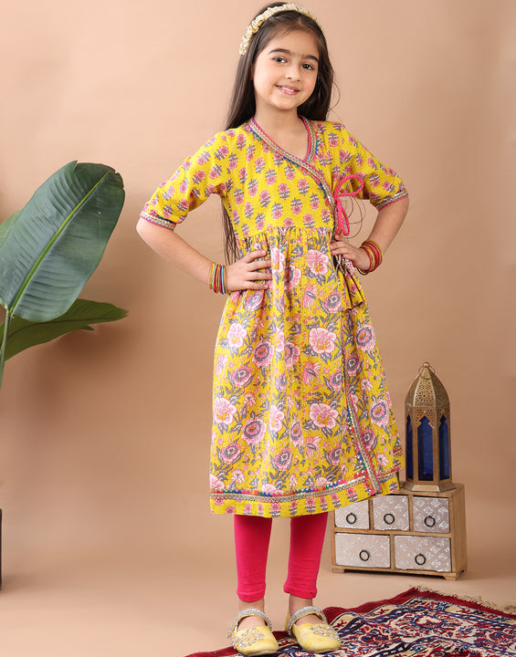 Yellow Printed Angrakha Kurti Paired With Leggings