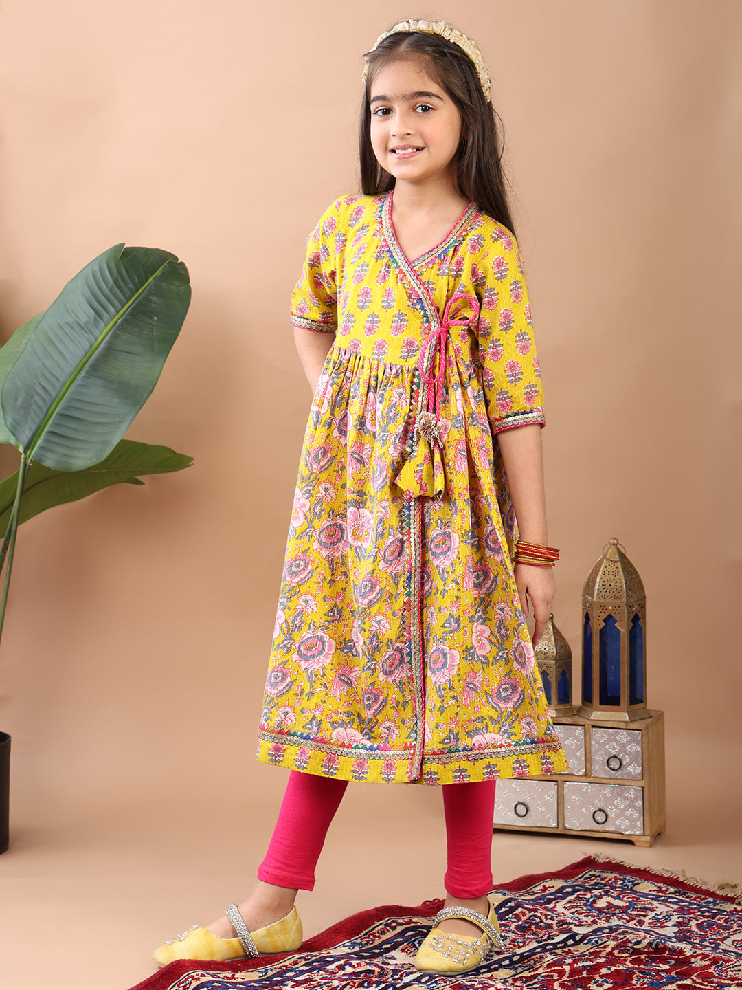 Yellow Printed Angrakha Kurti Paired With Leggings