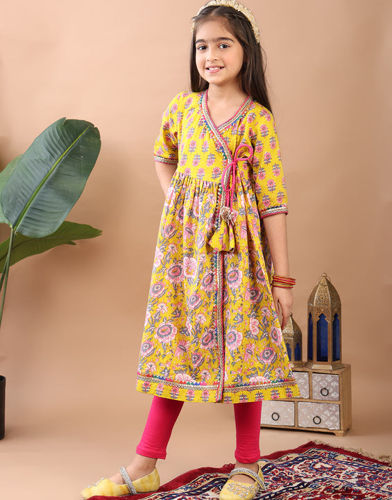 Yellow Printed Angrakha Kurti Paired With Leggings