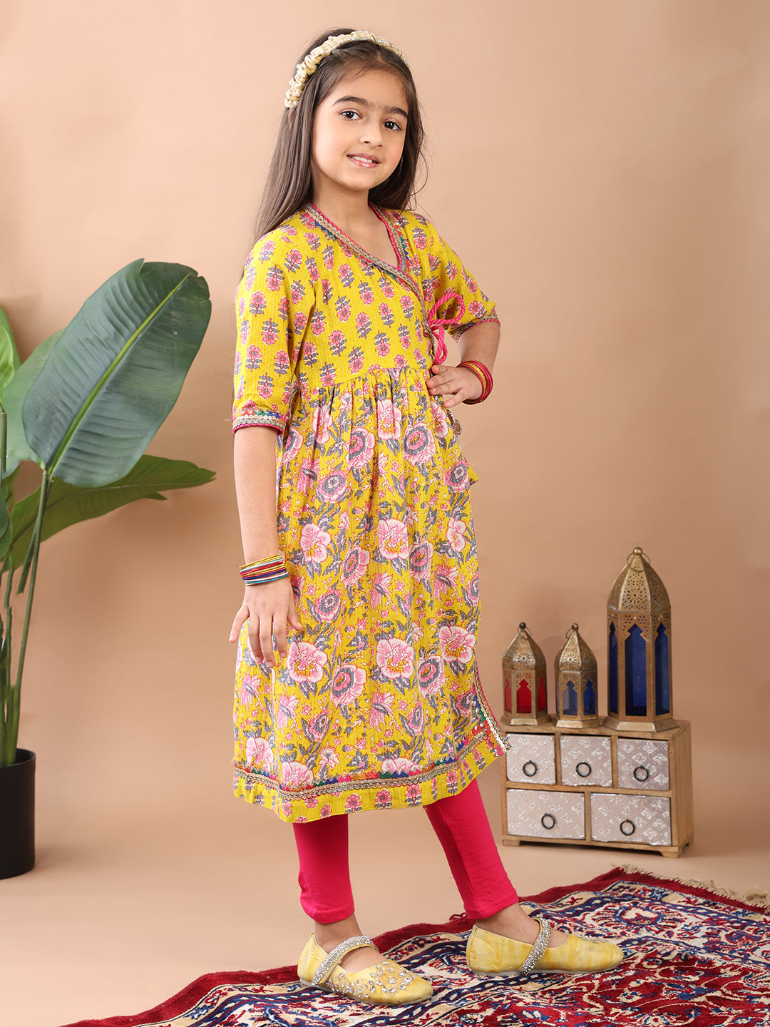 Yellow Printed Angrakha Kurti Paired With Leggings