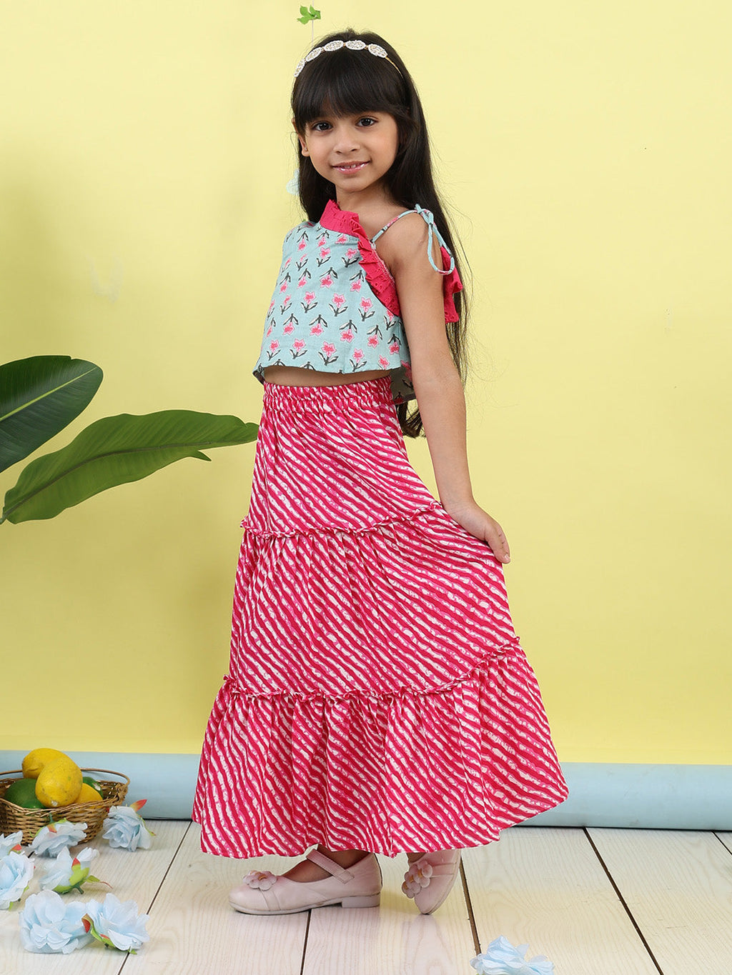 Green sleeveless floral printed top with Pink Lehriya Skirt