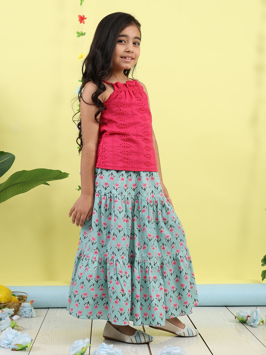 Pink sleeveless tie on hakoba top with Green floral printed Skirt