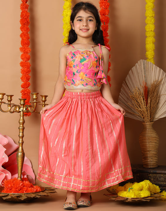 Pink Printed sleeveless top with pink golden lehenga
