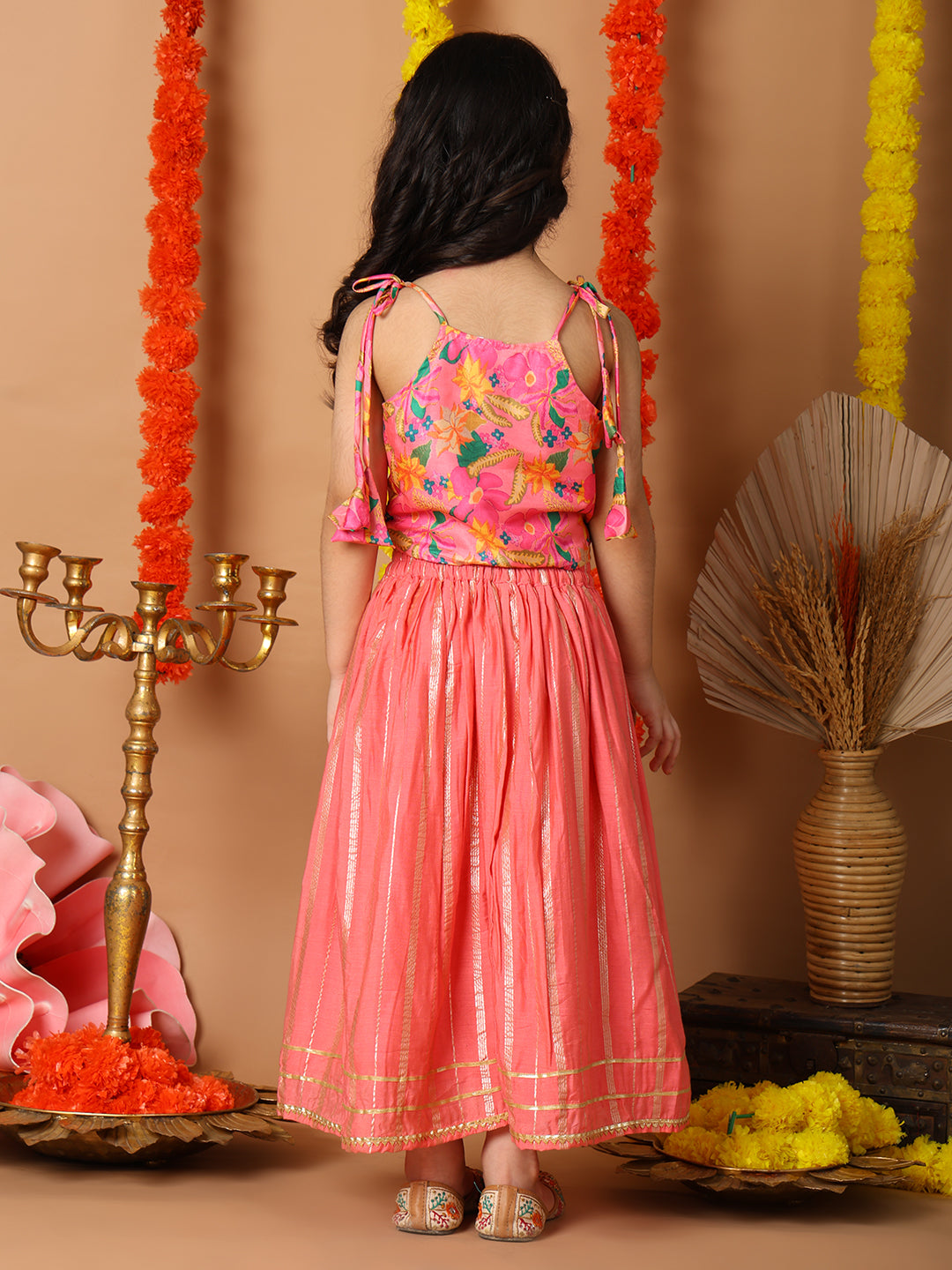 Pink Printed sleeveless top with pink golden lehenga