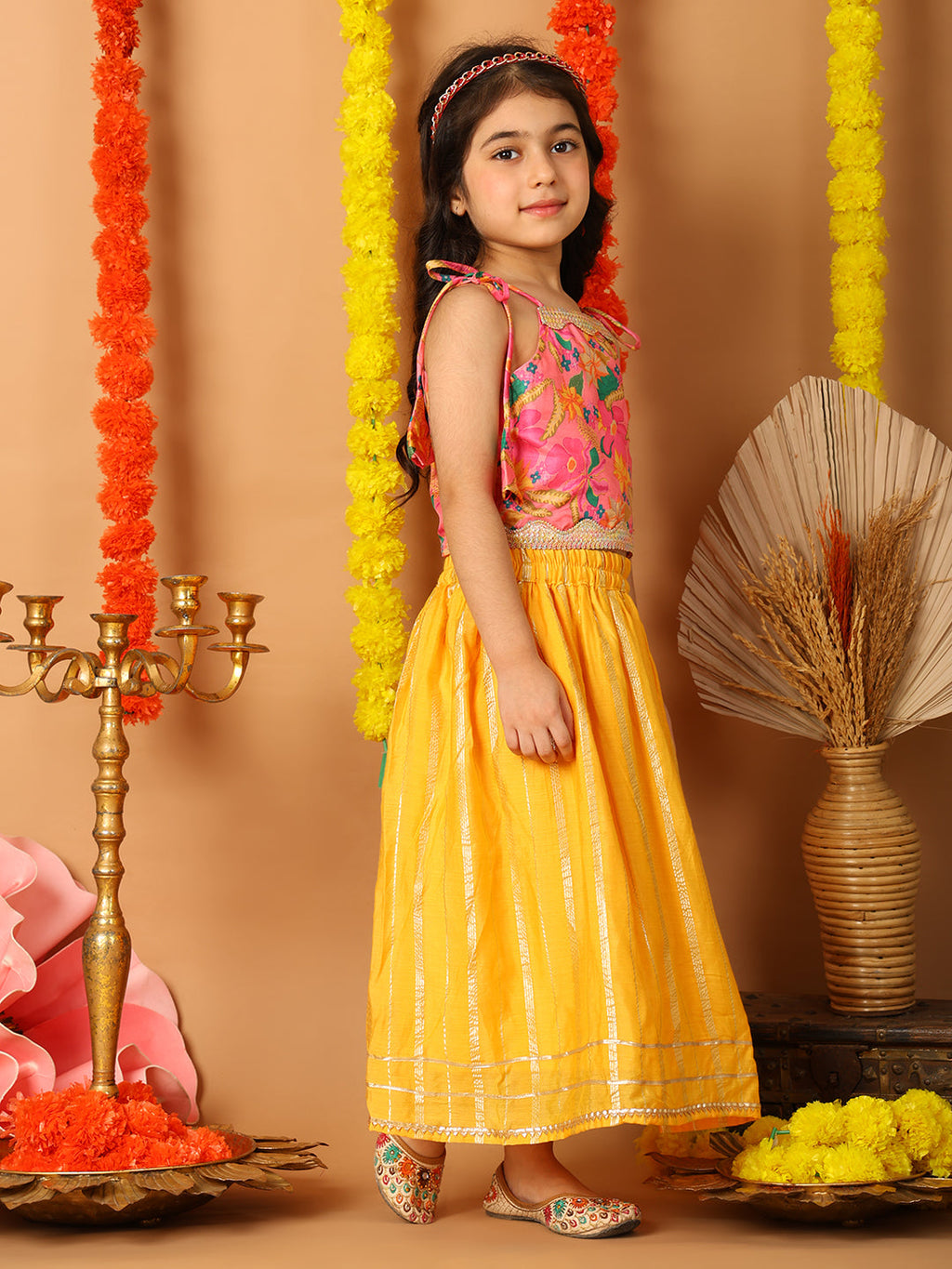 Pink Printed sleeveless top with Yellow golden lehenga