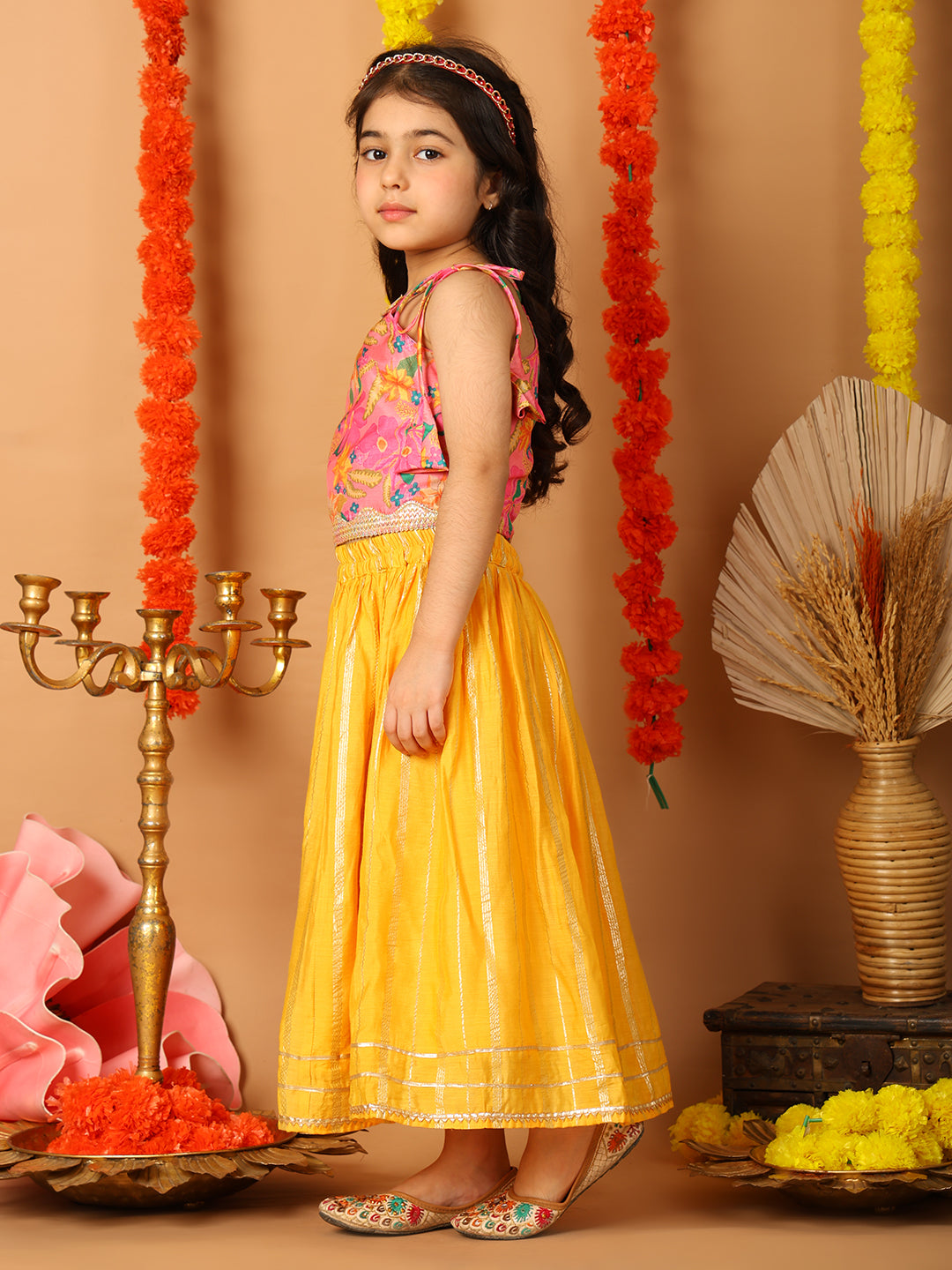 Pink Printed sleeveless top with Yellow golden lehenga