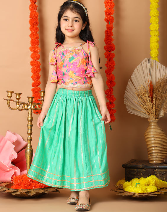 Pink Printed sleeveless top with Green golden lehenga