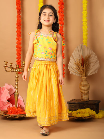 Yellow Printed sleeveless top with Yellow golden lehenga