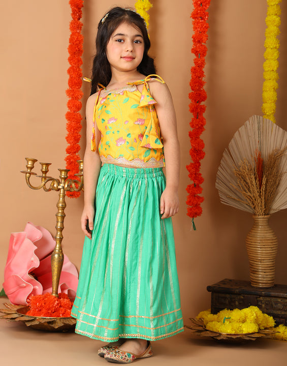 Yellow Printed sleeveless top with Green golden lehenga