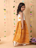 Yellow bandhani  printed  sleeveless lehenga set with mirror work jacket