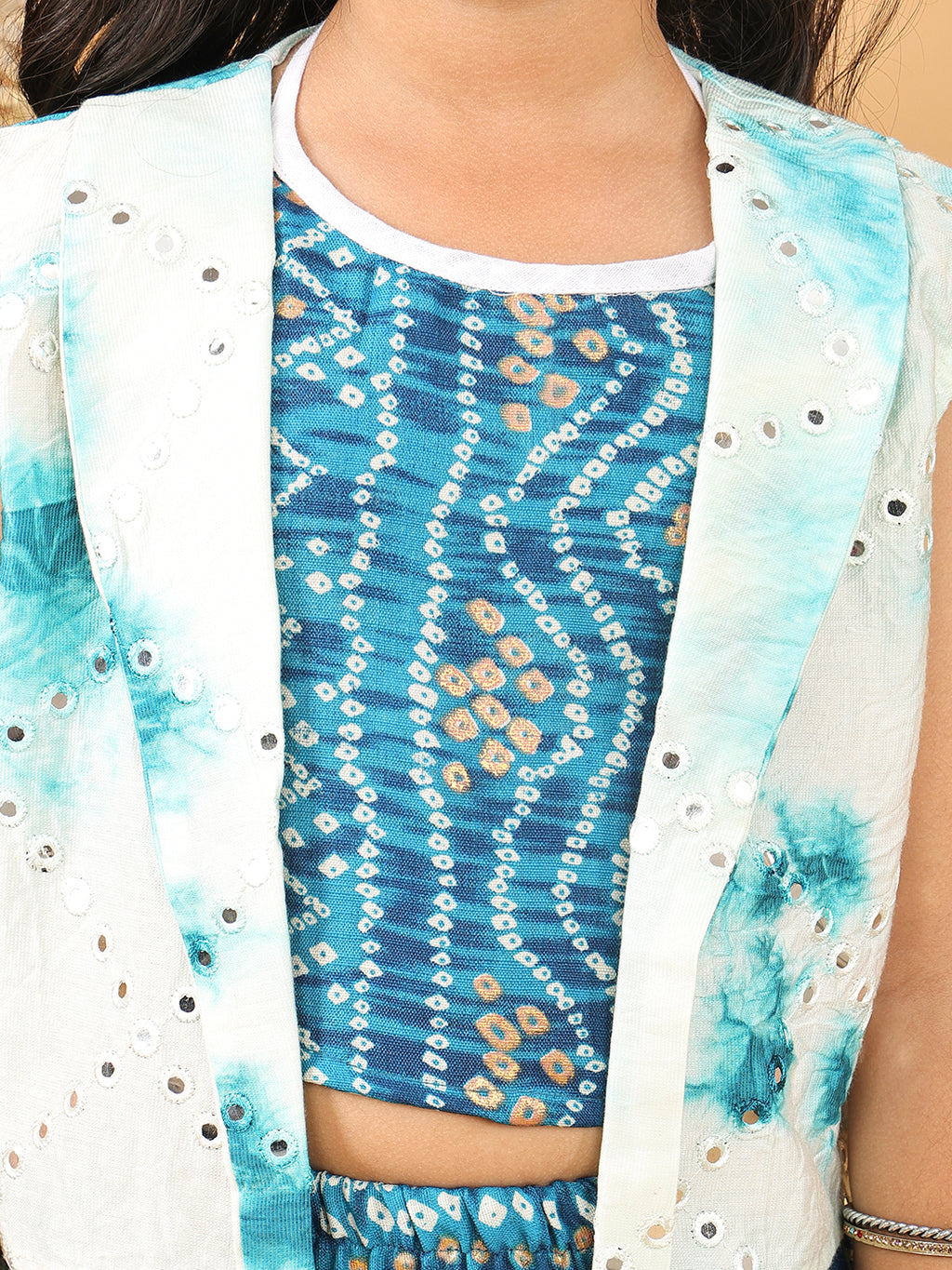 Blue bandhani  printed  sleeveless lehenga set with mirror work jacket