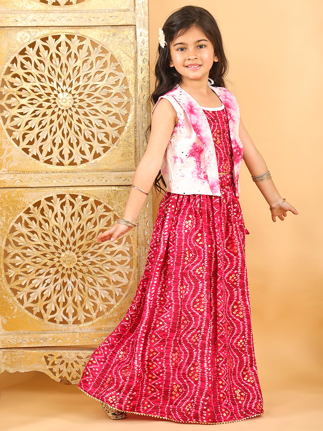 Pink bandhani  printed  sleeveless lehenga set with mirror work jacket