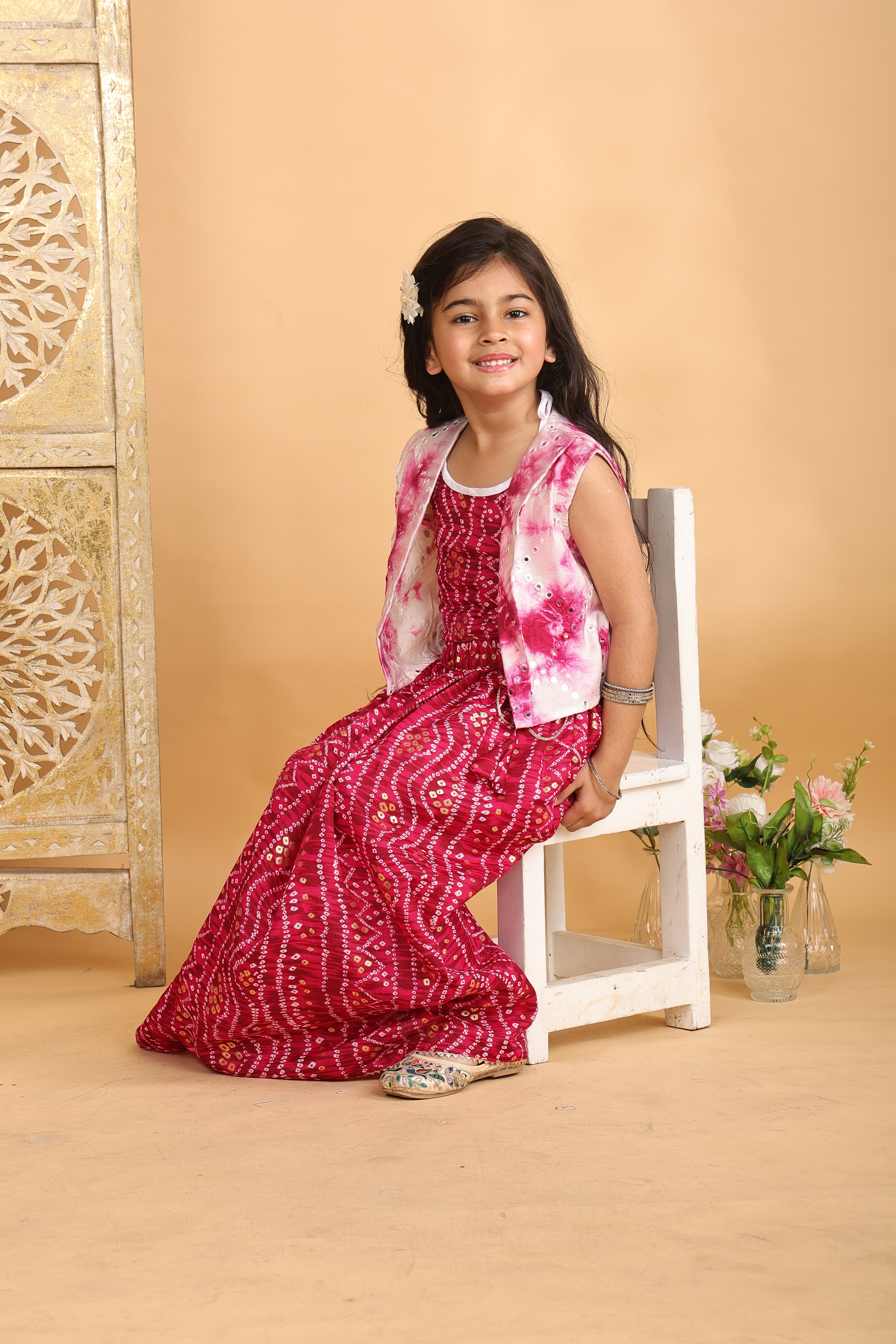 Pink bandhani  printed  sleeveless lehenga set with mirror work jacket