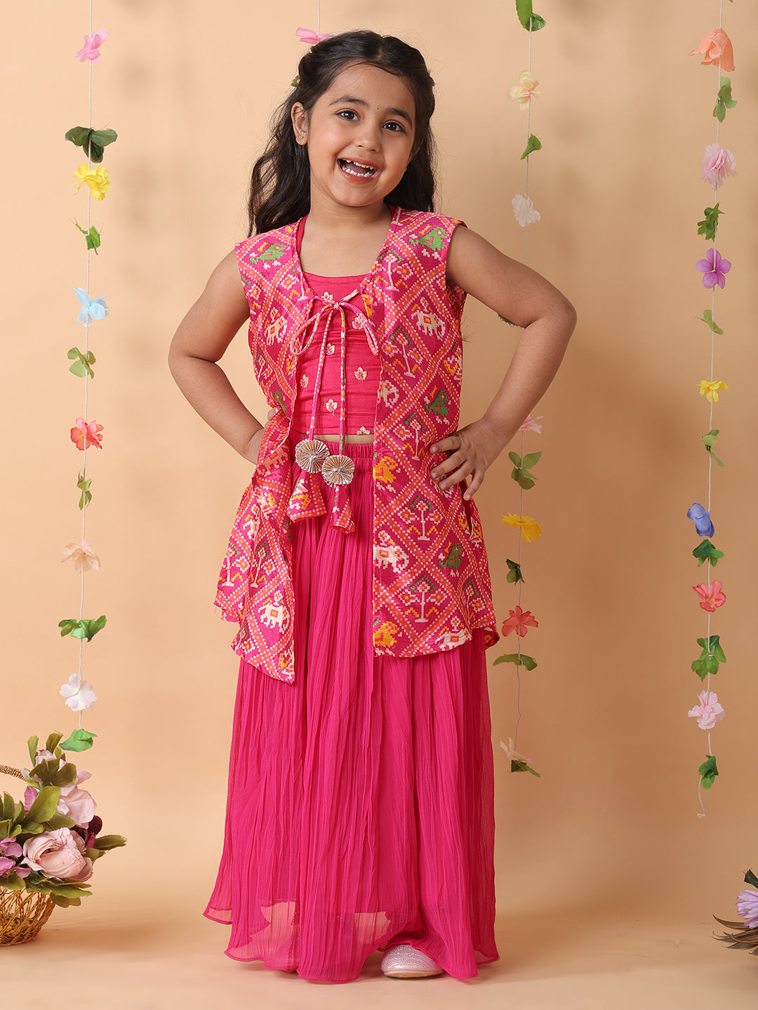 Pink crushed lehenga with embroidered top and patola long jacket