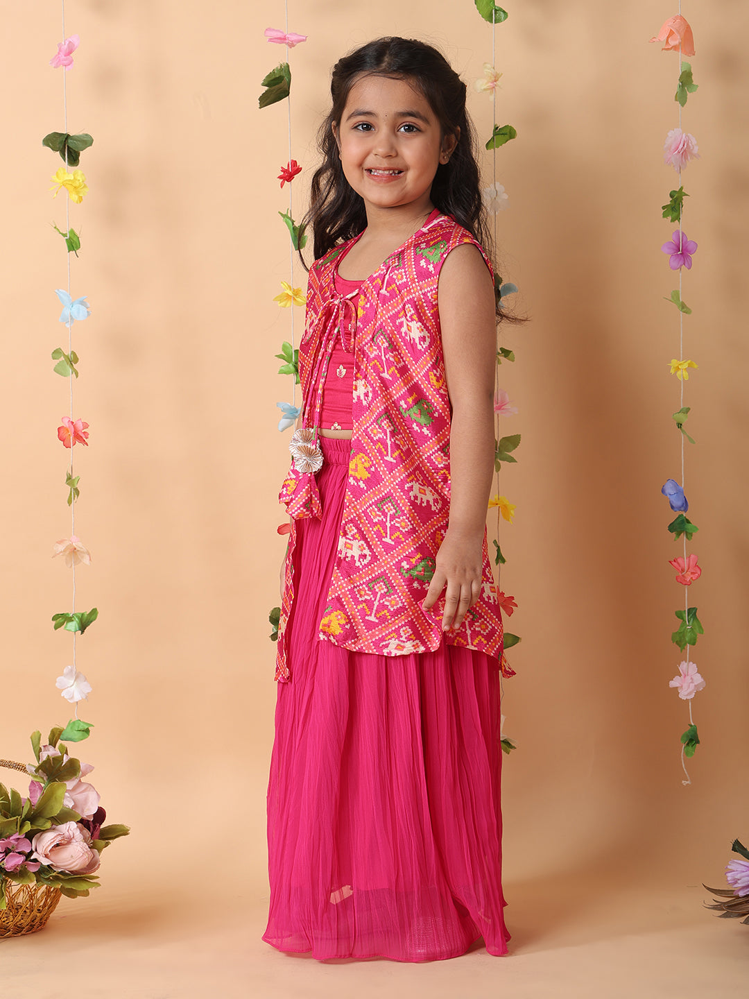 Pink crushed lehenga with embroidered top and patola long jacket