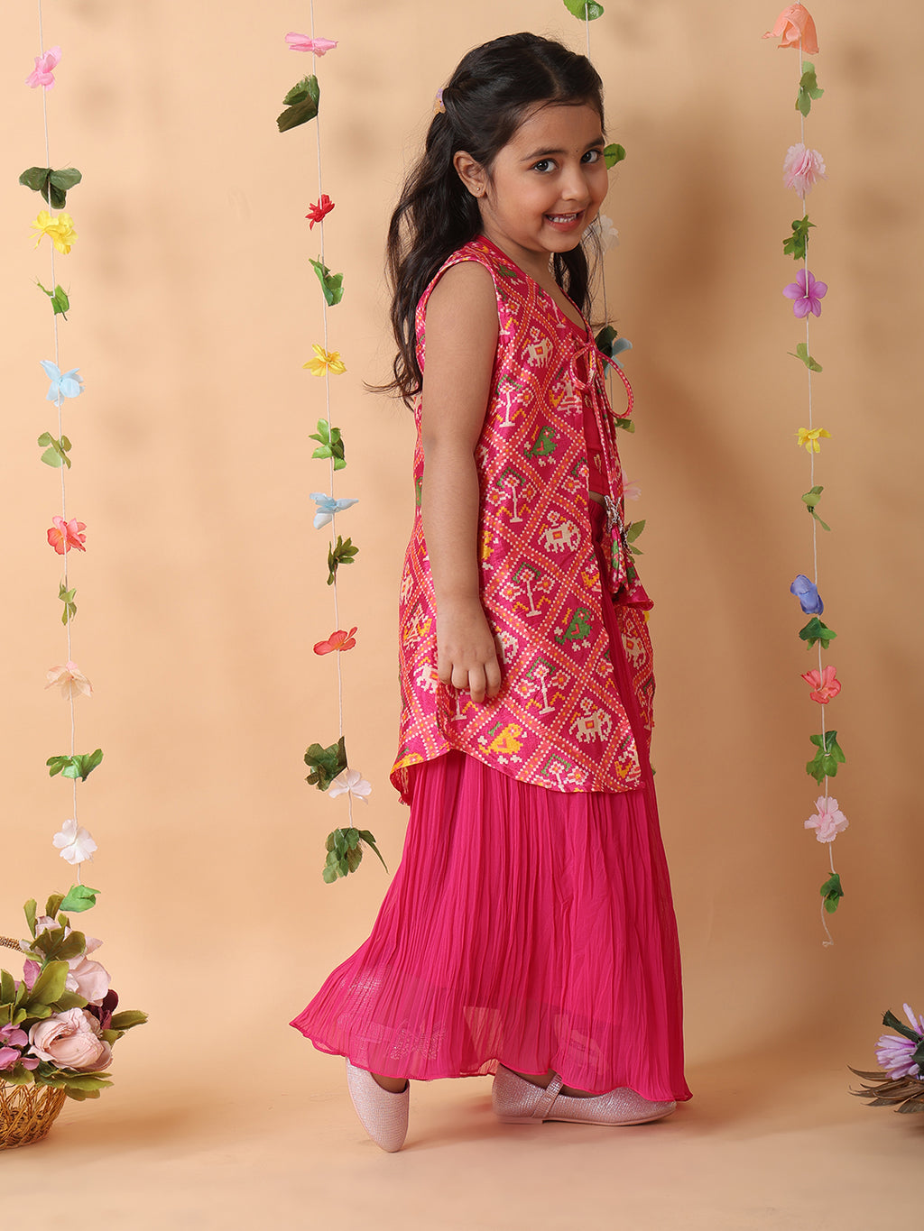 Pink crushed lehenga with embroidered top and patola long jacket