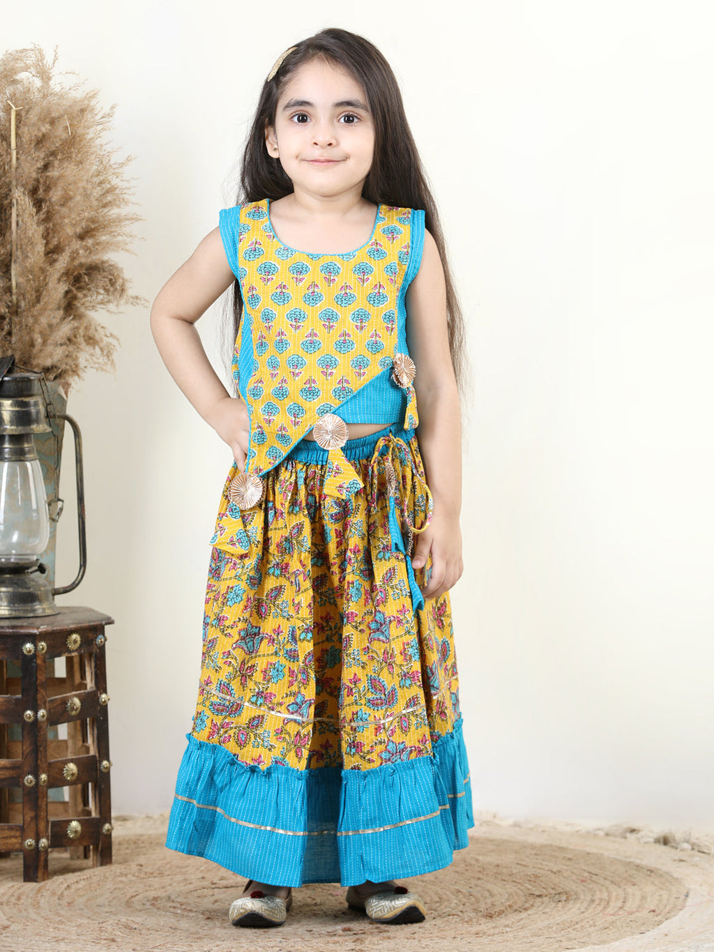 Yellow Cotton Katha Floral Printed Top with Tassels & Layered Lehenga