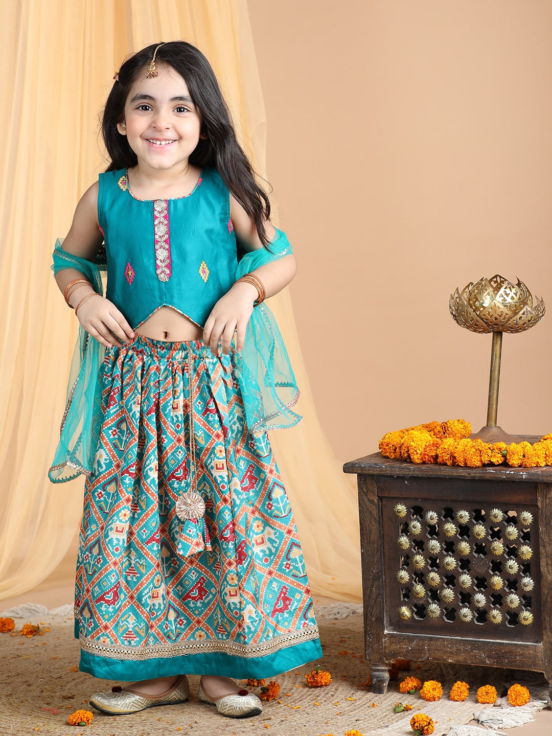 Embroidered Top with printed patola lehenga and dupatta