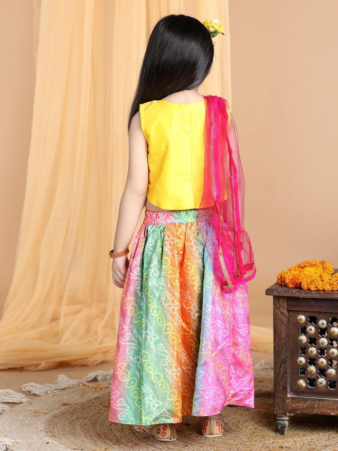 Yellow Top with multi color gold printed lehenga and dupatta