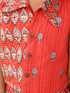 Red Lehenga with sleeveless collared embroidered top