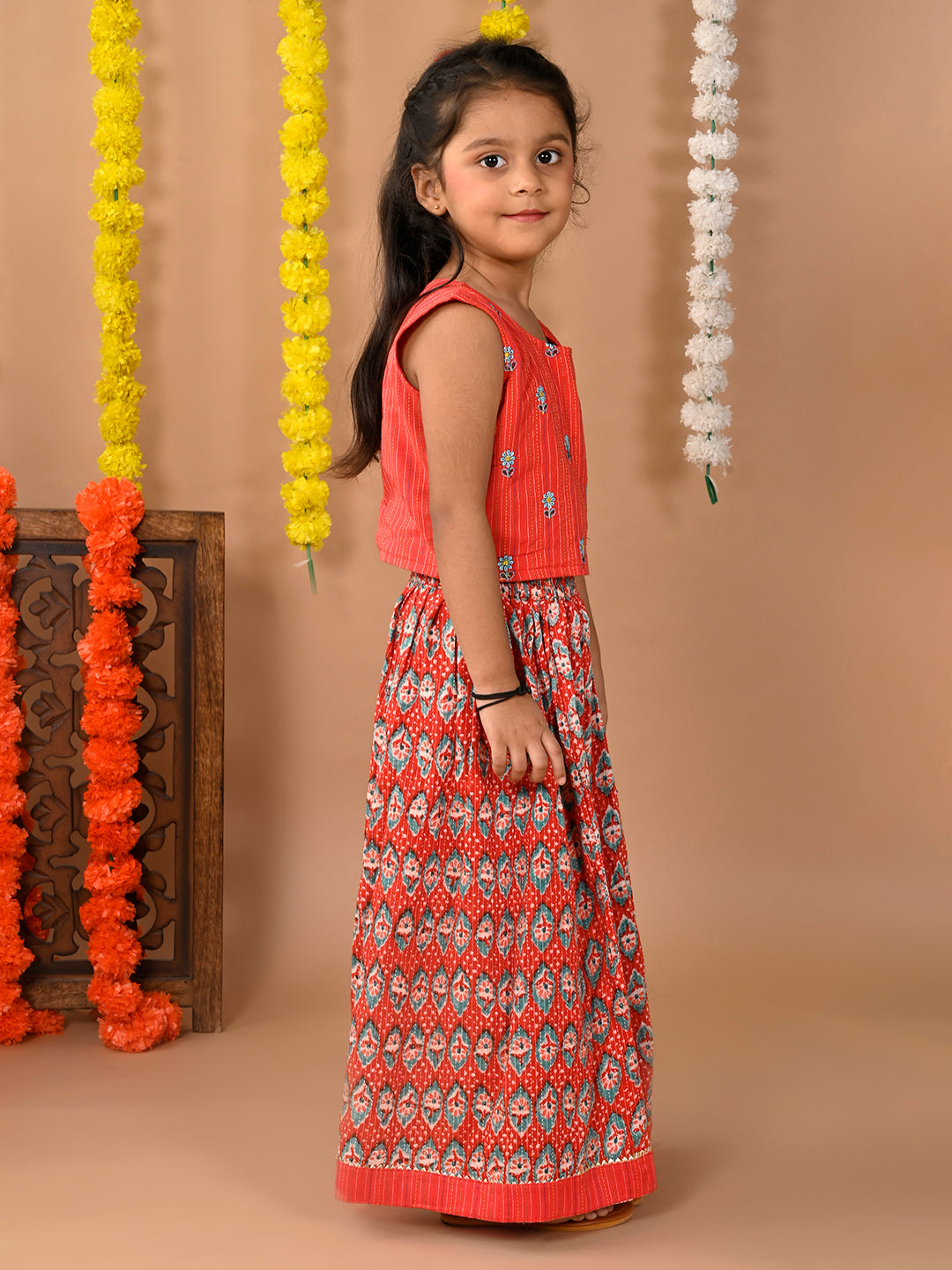 Red Cotton printed Lehenga with sleeveless embroidered top