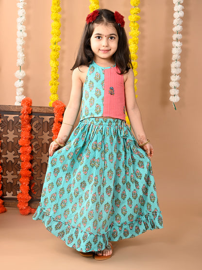 Green Cotton printed Lehenga with Peach sleeveless embroidered tie on top