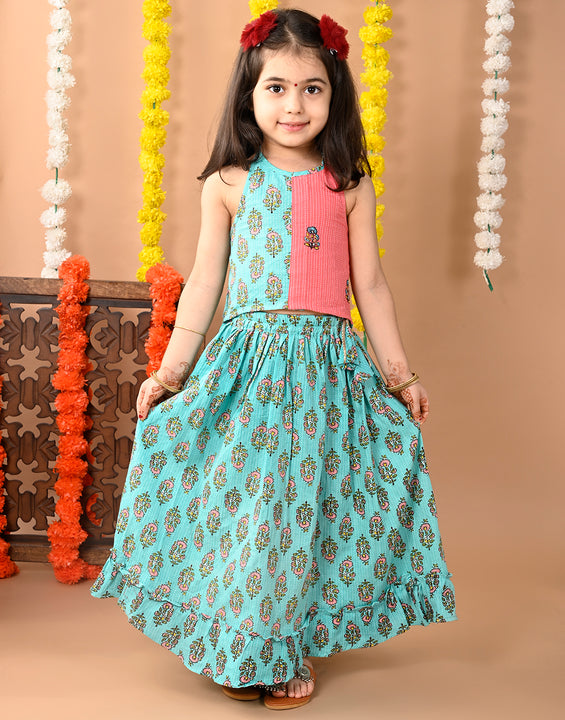 Green Cotton printed Lehenga with Peach sleeveless embroidered tie on top